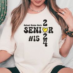 Customized Softball Senior 2024 T-shirts is the perfect gift for your Class of 2024 Senior!  Customize with your senior's school name and their number! In the personalization box, enter the school name and their number. (Ex: Western Hills High School, 15) This is made with the Bella & Canvas 3001 classic unisex jersey short sleeve tee.  It fits like a well-loved favorite, soft cotton and quality print make users fall in love with it over and over again. These t-shirts have-ribbed knit collars to White Varsity T-shirt For School, White Collegiate T-shirt For College Events, White Tops For School And Sports Season, White Tops For School Sports Season, White Team Spirit School T-shirt, White Team Spirit T-shirt For School, End Of School Year White T-shirt With Team Name, Team Name T-shirt For School Sports Season, Customizable White T-shirt For School Spirit