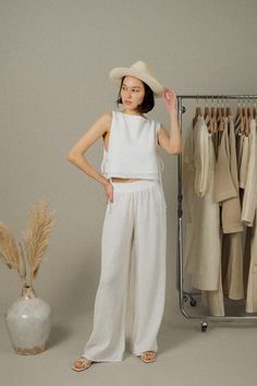 Walk into your day with our soft and light-weighted cotton Skye Palazzo Pants White, designed to make you feel confident and relaxed throughout your day. Feel at your best silhouette with these loose-fitting lounge pants featured with elasticated high waist to accentuate your natural waist. - 100% Turkish cotton- One size fits most- Elasticated waist Printed Linen Pants, Blue And White Roses, Resort Casual, Black Palazzo Pants, White Wide Leg Pants, Linen Drawstring Pants, Wide Leg Crop Pants, Wide Leg Dress Pants, Black Cargo Pants