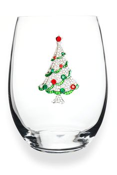 a wine glass with a christmas tree on it