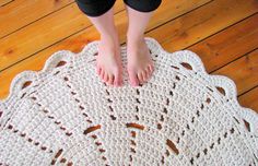 a person standing on top of a white doily