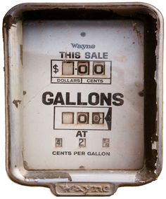 an old gas pump with the price displayed