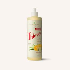 a bottle of thievee liquid on a white background