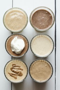 six different kinds of desserts in small cups