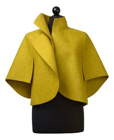 Wool Jacket - Dynamic proportions and crisp angles make this sculptural jacket an easy-to-wear statement piece. The artists unique arm awning sleeve design is open on bottom, providing both coverage and freedom of movement. Felted merino wool feels soft against the skin, yet is substantial enough to hold its shape for years of wear. Spring Merino Wool Outerwear For Work, Modern Structured Cropped Jacket For Fall, Elegant Merino Wool Outerwear For Spring, Chic Merino Wool Outerwear For Work, Chic Fitted Merino Wool Outerwear, Structured Wool Outerwear For Spring, Modern Merino Wool Outerwear For Fall, Modern Fitted Wool Coat For Fall, Modern Wool Outerwear For Spring