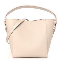 This is an authentic CHRISTIAN LOUBOUTIN Calfskin Spiked Mini Cabachic Mini Bucket Bag in Leche. This handbag is crafted of light pink embossed leather. The bag features leather strap handles with pink stud accents, silver hardware, a matching shoulder strap, and an embossed logo script across the base. The top is open to a matching leather interior. Cream Crossbody Bucket Bag For Evening, Cream Bucket Bag With Adjustable Strap For Evening, Formal Beige Bucket Bag With Leather Handles, Formal Cream Shoulder Bag With Leather Handles, Cream Bucket Bag With Detachable Strap For Evening, Formal Cream Hobo Bag With Detachable Strap, Formal Cream Bucket Bag With Detachable Strap, Formal Cream Leather Bucket Bag, Formal Cream Bucket Shoulder Bag