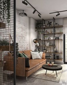 a living room filled with furniture and lots of bookshelves on top of it