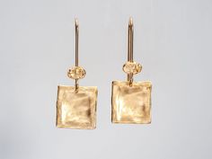 These bohemian earrings feature hammered squares attached to ear wires. Suitable for everyday wear, lightweight and comfortable. The perfect way to add personality and a little sparkle to your ears!  Perfect as a gift for yourself or for a loved one!  Specifications: ◈ Each square is 13mm(0.51 inches) in diameter ◈ Thickness: 0.8mm (0.03 inches) ◈ Each earring measures 13mm (0.51 inches) wide by 33mm (1.29 inches) long.  ◈ Material: My earrings are made of 2 micron of 18k gold plating over brass Gold Hammered Rectangular Earrings, Elegant Hammered Rectangular Earrings, Elegant Rectangular Hammered Earrings, Earrings Boho Chic, Boho Chic Earrings, Chic Earrings, Valentines Day Gifts, Earrings Elegant, Bohemian Earrings