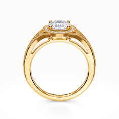 a yellow gold engagement ring with an oval center stone and two rows of diamonds on the band