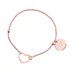 A delightful touch to any attire, the initial personalized bracelet makes a big impression. Meaningful and stylish, it offers lots of details to love. A true classic that's perfect for pairing with a variety of fashions, it makes a meaningful signature piece for yourself or someone special.Material: 925 SilverPlating Color: Silver, Yellow Gold, Rose Gold Classic Rose Gold Metal Bracelets, Elegant Metal Name Bracelet For Mother's Day, Personalized Rose Gold Metal Name Bracelet, Classic Adjustable Rose Gold Charm Bracelet, Valentine's Day Rose Gold Metal Charm Bracelet, Rose Gold Metal Bracelets For Valentine's Day, Elegant Personalized Heart Metal Bracelet, Elegant Adjustable Chain Bracelet For Valentine's Day, Rose Gold Metal Bracelet For Valentine's Day