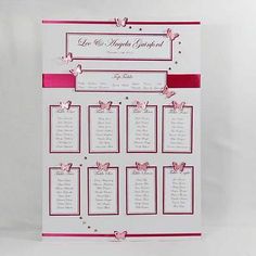 a wedding seating chart with pink ribbon and bows on it's side, in front of a white background