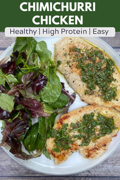 pan fried chicken breasts topped with chimichurri and served with a salad