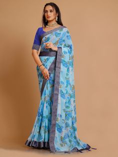 Jisha Georgette Floral Printed Brocade Border Saree Soft easy to wear georgette fabric. Beautiful floral print with stone Brocade border Comes with waist belt. Comes with unstitch blouse fabric. Effortlessly elegant and versatile, the Jisha Saree is the perfect addition to any wardrobe. Made from soft and lightweight Georgette fabric, it features a stunning floral print and intricate brocade border. Georgette Pre-draped Saree With Floral Print, Navratri Floral Print Georgette Pre-draped Saree, Fitted Blue Pre-draped Saree With Floral Print, Diwali Floral Print Georgette Pre-draped Saree, Floral Print Georgette Traditional Wear, Bollywood Style Blue Floral Saree, Blue Floral Print Georgette Blouse Piece, Blue Floral Print Blouse Piece In Georgette, Navratri Georgette Saree With Floral Print