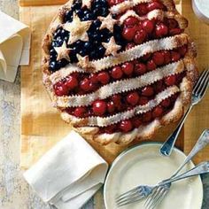 an american flag cake with berries on it