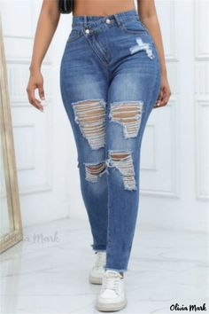 Olivia Mark - Chic High Waisted Distressed Skinny Denim Jeans for a Casual Look High Rise Ripped Denim Jeans, Fitted High Rise Jeans With Holes, Fitted High-rise Jeans With Holes, Ripped Non-stretch Denim Jeans, Ripped High Rise Denim Bottoms, High Rise Ripped Denim Bottoms, Ripped Non-stretch Mid-rise Jeans, Non-stretch Ripped Denim Blue Jeans, Ripped Denim Bottoms For Spring