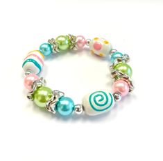 Easter Bracelet For Girls, Spring Easter Egg Glass Beaded Pastel Jewelry For Women Kids Children, Christmas Birthday Gift Idea, 1 pc This one of a kind delicately hand painted glass beads bracelet is perfect to wear to Easter's party! Bracelet Length around 7.5in, inner diameter circumference 2.25 inch.   Made by 13x18mm hand painted oval glass beads with multi ply elastic cord.  Celebrate the happy festival by giving your friends and family a beautiful bracelet and they will remember you when w Birthday Gift Basket, Quiet Person, Pastel Bracelet, Spring Easter Eggs, Pastel Jewelry, Bracelet For Girls, Giveaway Gifts, Easter Jewelry, Green Beaded Bracelets