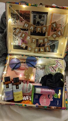 an open suitcase filled with personal care items