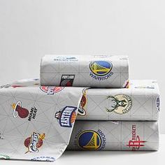 three sheets are stacked on top of each other with different sports logos all over them