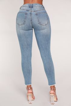 Available In Light Blue Wash High Rise Stretch Denim 5 Pockets Fray Hem 26" Inseam Disclaimer: Due To The Specialized Wash Process. Each Item Is Unique. 64% Cotton 32% Polyester 2% Rayon 2% Spandex Imported Stretch Denim Bottoms With Frayed Hem, Mid-rise Denim Jeggings With Frayed Hem, Stretch Denim Blue Jeans With Frayed Hem, Fitted Washed Blue Bottoms With Frayed Hem, Mid-rise Medium Wash Jeggings With Frayed Hem, Mid-rise Denim Blue Bottoms With Frayed Hem, Denim Blue Stretch Cropped Jeans, Blue Mid-rise Bottoms With Frayed Hem, Light Wash Stretch Denim Jeggings