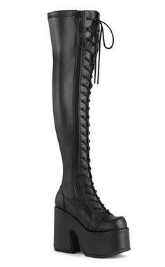 Awesome stretch thigh-high boots in matte black vegan leather with laces alllll the way up! Full-length zip for easy on and off. The Camel series is the ultimate chunky platform boot. Whether you're looking to make a statement or just a new staple, your wardrobe will love these babies! Vegan Black PU leather 127mm (5-inch) heel 75mm (3-inch) platform Black lace up Rear zipper Women's U.S sizing - refer to size chart for more info Please note: these heels are in our warehouse, ready to ship. If y Rave Boots, Stretch Thigh High Boots, Leather Thigh Boots, Demonia Boots, Festival Boots, Leather Over The Knee Boots, Gothic Boots, Demonia Shoes, Platform Boots Chunky