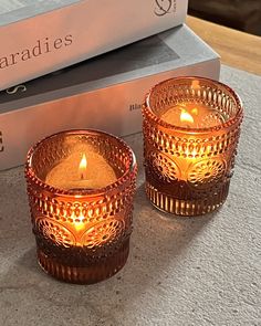 PRICES MAY VARY. 12 PCS candle holders: Each amber tealight candle holder measures 2.17"(bottom 2")D x 2.67"H, perfect for regular tealight candles votive and LED light (less than 1.5" width diameter) Thicker glass craft: The glass candle holders are carefully crafted from premium thick glass which is more durable and weighty than regular votives, use the votive candle holders to easily decorate your home, shelf, fireplace, or office, help create an elegant and romantic atmosphere for your home Wedding Table Votives, Votives Wedding, Shelf Fireplace, Mini Candle Holders, Birthday Christmas Party, Home Shelf, Glass Tealight Candle Holders, Christmas Party Decor, Small Candle Holders