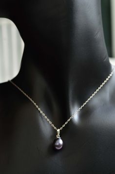 "Freshwater pearl pendant with chain, Purple freshwater pearl pendant with delicate silver 925 chain Purple freshwater pearl bridal necklace jewelry.  Natural purple freshwater pearls jewelry.  Bridesmaid pearl gift. Materials        :  natural fresh water pearl, sterling silver Dimensions   :  pearl 9 x11 mm Total drop      :   18.4 mm ♥ All items come in individually gift box or pouch. It is ready to send as a gift for your special person. ♥ GIFT PURPOSES If this is a gift, we can also send the jewelry piece to the recipient. Please simply put down the recipient's address as the shipping address when you checkout. We can also include a little card with a message for you inside- Let us know in the \"Note to Seller\" section when you check out ♥ For hygiene purpose, earrings are not accept Drop Pearl Pendant Necklace As Gift, Silver Drop Pearl Necklace With Pendant, Pearl Necklace With Silver Chain As A Gift, Pjo Oc, Bridal Pearl Necklace, Pearl Gifts, Pearls Jewelry, Bridesmaid Pearls, Freshwater Pearl Jewelry