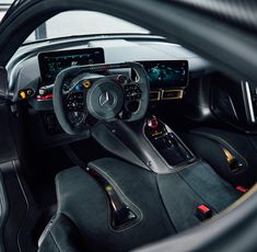 the interior of a mercedes benz sports car