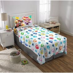 a child's bedroom with mickey mouse bedding