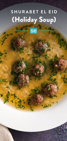 a white bowl filled with soup and meatballs