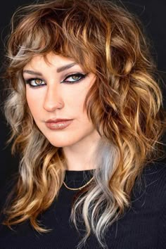 Medium Length Layered Hair And#8211; Best Ideas For Stunning 2023 Look ★ Full Volume Layered Haircut, Funky Short Blonde Hair, Shag With Peekaboo Highlights, Shag On Round Face, Medium Curly Shag With Bangs, Funky Medium Length Haircut, Edgy Haircuts Medium, Edgy Layered Hair, Edgy Medium Length Hair