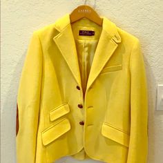 This Is One Of My Favorite Pieces But Believe It Or Not I Have Never Worn It. It Is Almost Brand New. I Noticed A Small Hole On The Right Arm Of The Coat After I Bought It. I Decided To Fix It And Patch It Up As It Is A Very Expensive Coat. Other Than That It Is In Absolute Mint Condition. Yellow Fitted Blazer For Work, Yellow Wool Long Sleeve Outerwear, Yellow Long Sleeve Blazer With Button Closure, Fall Yellow Blazer With Button Closure, Yellow Blazer With Button Closure For Fall, Classic Single-breasted Yellow Blazer, Fitted Yellow Winter Blazer, Yellow Single Breasted Blazer For Spring, Fitted Yellow Blazer For Winter