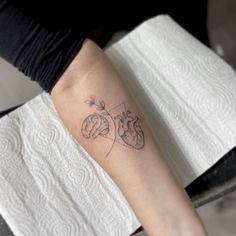 a person with a tattoo on their arm