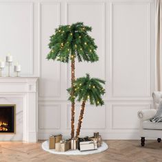 a living room with a christmas tree and presents on the floor