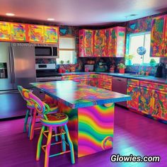 the kitchen is decorated in bright colors and has an island with stools on it