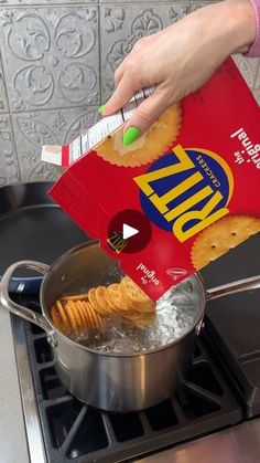 a person is pouring chips into a pan on the stove