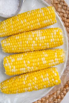 corn on the cob with text overlay how long do boil corn? answers to all your corn questions