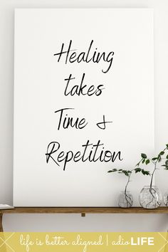 a white poster with the words heading takes time and repeptition on it next to some vases