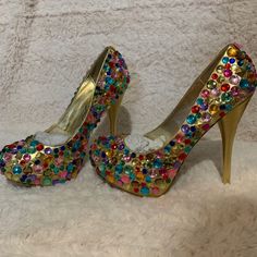 These Are A Show Stopping Pair Of Heels That Are Brand New! You Will For Sure Be The Center Of Attention In These Babies They Are Sewed On And Not Glued! Which Is Awesome! Heel: 4.5 Inches Party Heels With Bling And Closed Toe, Embellished Heels With Round Toe For Party Season, Gold Heels With Bling And Round Toe, Multicolor Embellished Heels With Round Toe, Multicolor High Heel Wedding Shoes, Multicolor High Heels For Wedding, Elegant Multicolor Rhinestone Heels, Multicolor Rhinestones Heels For Evening, Bedazzled Gold Heels For Party