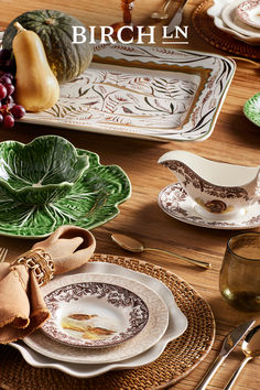 an image of a table setting for thanksgiving dinner