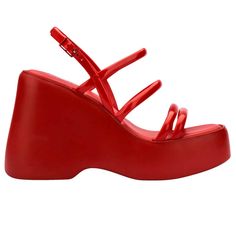 The Melissa Jessie Platform has four narrow straps over the foot and one around the heel, and counts on a buckle fastener that creates the perfect stable fit. It is light and comfortable, and the perfect versatile choice to keep you walking on clouds - both height-wise and comfort-wise! It is perfect for fashion lovers who want a retro-inspired, ultra-high style that is still extraordinarily comfortable. The platform sole extends all the way to the front of the shoe, which makes the wearer feel Double Strap Heels With Removable Insole, Modern Red Heels With Removable Insole, Modern Red Sandals With Heel Loop, Red Heels With Buckle Closure, Synthetic Sandals With Red Sole And Ankle Strap, Synthetic Ankle Strap Sandals With Red Sole, Modern Red Sandals With Single Toe Strap, Modern Heels With Strap And Round Toe, Melissa Gorga