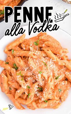 penne alla vodka with parmesan cheese on top in a white bowl next to bread