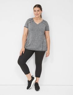 Available in Plus Size. A wicking LIVI Active tee with flattering seams. V-neck. Short sleeves.

With wicking technology: supportive stretch and fade-resistant, moisture-wicking and quick-drying fabric.                                                      Item Number #352651Length: 30"Imported Plus Size Activewear Plus Size Exercise Outfits, Plus Size Exercise, Plus Size Athletic Wear, Exercise Outfits, All In Motion, Pants Dress, Plus Size Activewear, Princess Seams, Plus Size Top