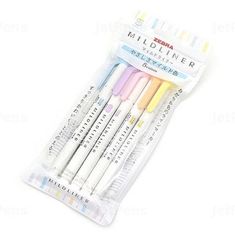 four different colored pens in a package on a white background with the words mikiliner written