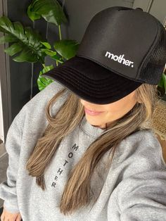 Simple and chic. This hat is for those who prefer a quieter, more minimalist style everyday hat. "mother" is embroidered in small white print on the left side of our premium trucker hat in Black. Feel strong and empowered while wearing this hat. Features: High profile, structured Color: Black "mother." embroidered in white Slightly curved visor "Strong as a mother" tag inside hat Foam trucker with nylon mesh back Plastic snapback We donate 10% of our proceeds to charitable organizations supporti Everyday Trucker Hat One Size Fits Most, Black Trucker Hat With Curved Visor For Everyday, Black Trucker Hat One Size Fits Most For Everyday, Black Trucker Hat With Letter Print For Everyday, Black Everyday Trucker Hat One Size, Black Snapback Trucker Hat For Everyday, Everyday Black Snapback Trucker Hat, Everyday Trucker Snapback Hat, Everyday Trucker Hat With Curved Bill