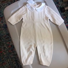 Cream Colored With White Peter Pan Collar Buttons Up The Back White Fitted Onesie For Baptism, Fitted White Onesie For Baptism, White Long Sleeve Onesie For Baptism, Cream Long Sleeve Onesie For Playwear, White Fitted Winter Onesie, White Winter Playwear For Babies, Snow Overalls, Teddy Bear Sweater, Houndstooth Skirt