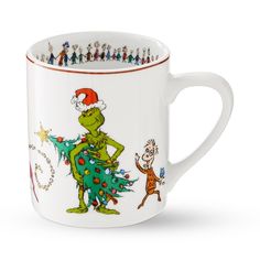 a christmas mug with the grin on it