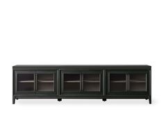 the sideboard with glass doors is black and has shelves on both sides, one door open