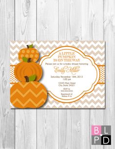 a baby shower card with pumpkins and chevron stripes on the front, and an orange