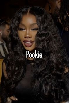 a woman with long black hair and the words pookie