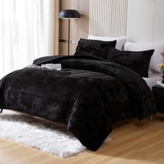 PRICES MAY VARY. Package Includes: 1 queen comforter (90" x 90") and 2 pillowcases (20" x 26"); Due to vacuum packaging, the comforter may appear thin and flat, please shake it vigorously to restore its fluffiness High-Quality Material: Side A: 220GSM short shaggy faux fur fabric; Side B: 100% brushed microfiber. Our comforter features a soft and warm short plush surface, retains a delicate appearance, resists knots after machine washing, and does not shed U-Shaped Quilting Design: The plush comforter is filled with 300g/m² microfiber cotton, and its U-shaped quilting keeps the filling in place for a softer, fluffier, and warmer feel Simple & Elegant: The faux fur comforter set provides a cozy and luxurious look, keeping you warm and comfortable throughout the year. It is a great choice fo Velvet Comforter Bedroom, Oversized King Quilt, Fur Bed Throw, Faux Fur Comforter, Fur Bed, Fur Comforter, Fluffy Comforter, Velvet Comforter, Fur Bedding