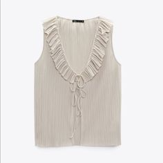 Sleeveless Ruffled V-Neck Top. Front Ties And Opening Brand New With Tags Spring V-neck Tank Top With Ruffles, V-neck Ruffled Tank Top For Spring, Spring V-neck Ruffled Tank Top, Feminine V-neck Vest For Summer, Summer Feminine V-neck Vest, Summer Tie Neck Blouse With Ruffles, Ruffled V-neck Tank Top For Party, Feminine V-neck Vest For Spring, Chic Ruffled Tank Top